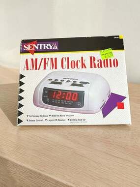 Sentry CR102 AM/FM Digital Clock Radio with LED Display and Battery Backup